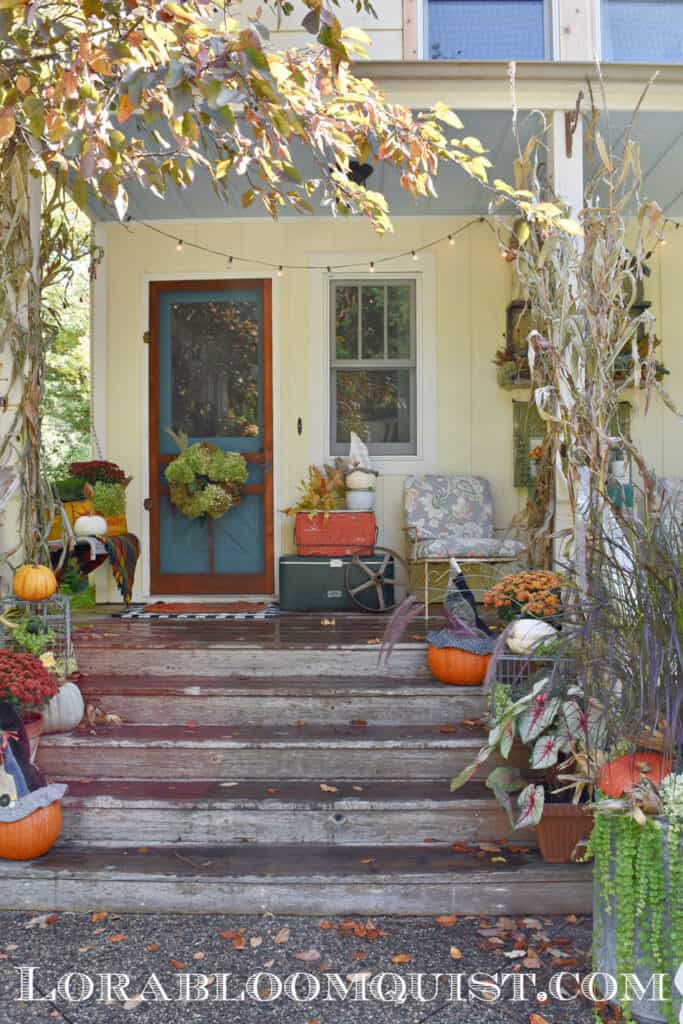 Vintage Fall farmhouse porch decor.
