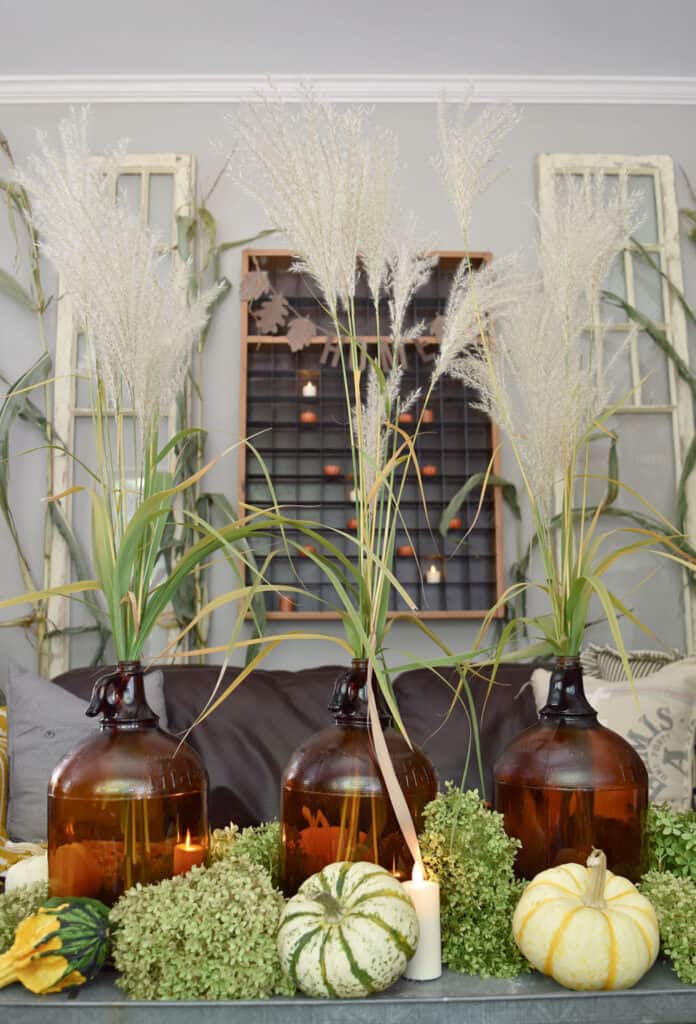Brown jugs with grasses