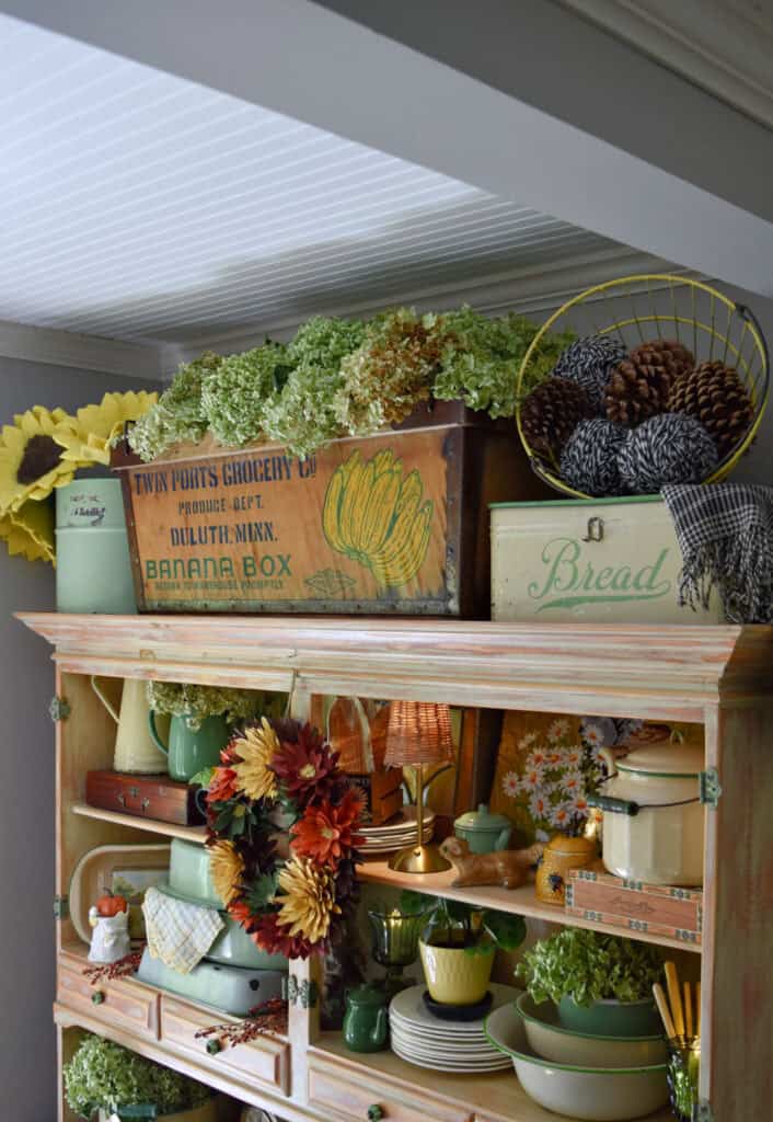 Fall hutch display with vintage thrifted finds.