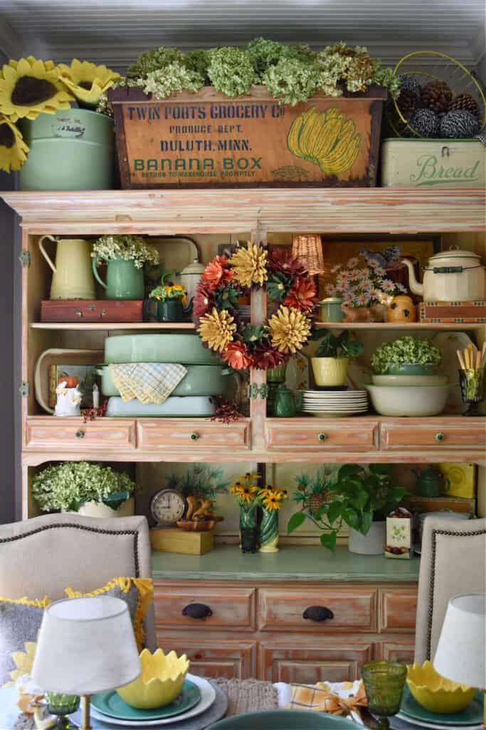 Fall hutch display with vintage thrifted finds.