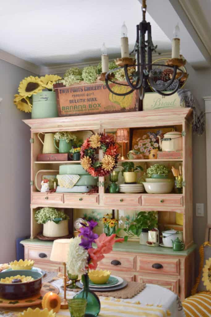 Fall hutch display with vintage thrifted finds.