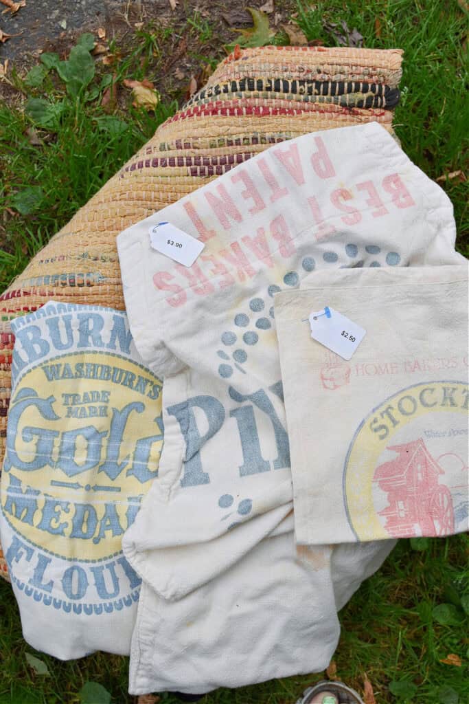 Thrifted vintage feed sacks and rag rug.