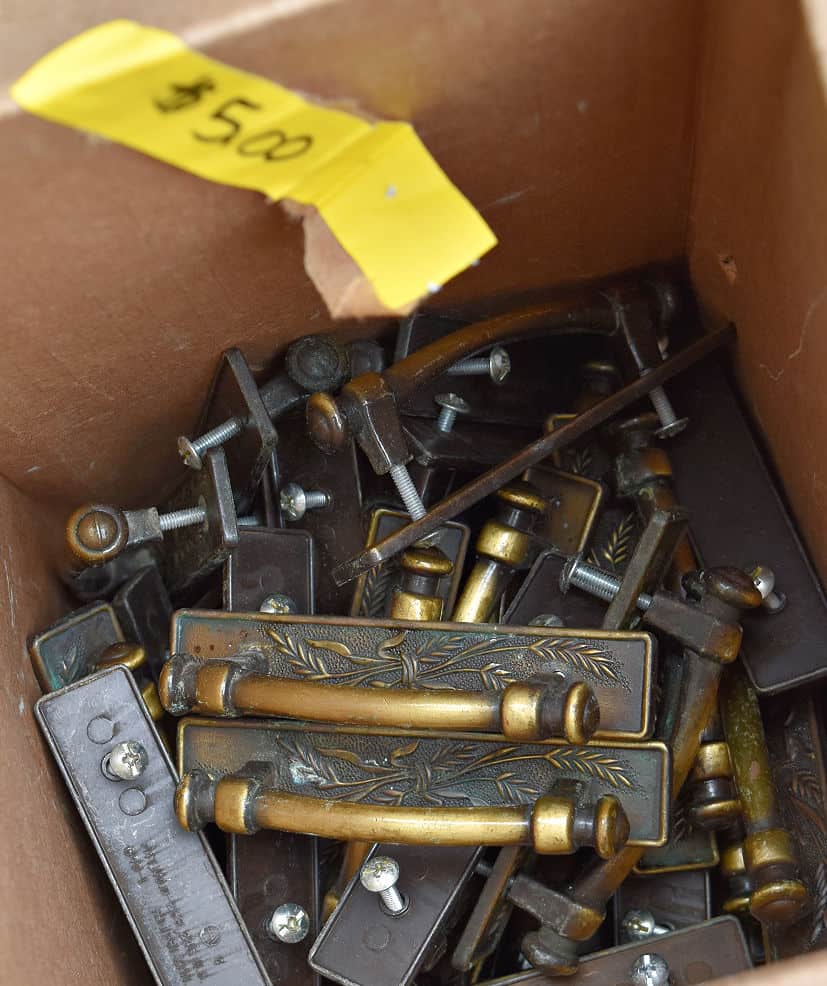 Thrifted brass handles.