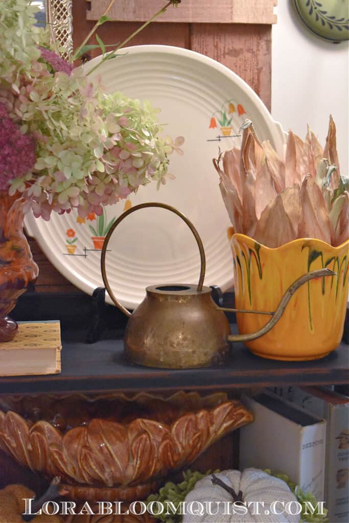 Vintage pottery Fall display.