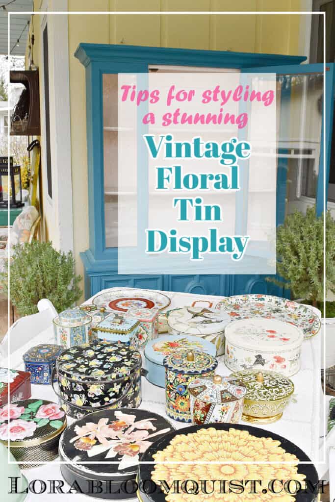 Decorating a hutch with vintage floral tins.