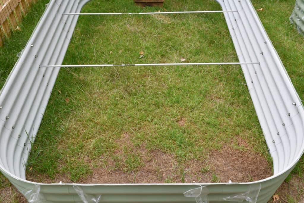 Putting together Vego garden raised bed garden container.
