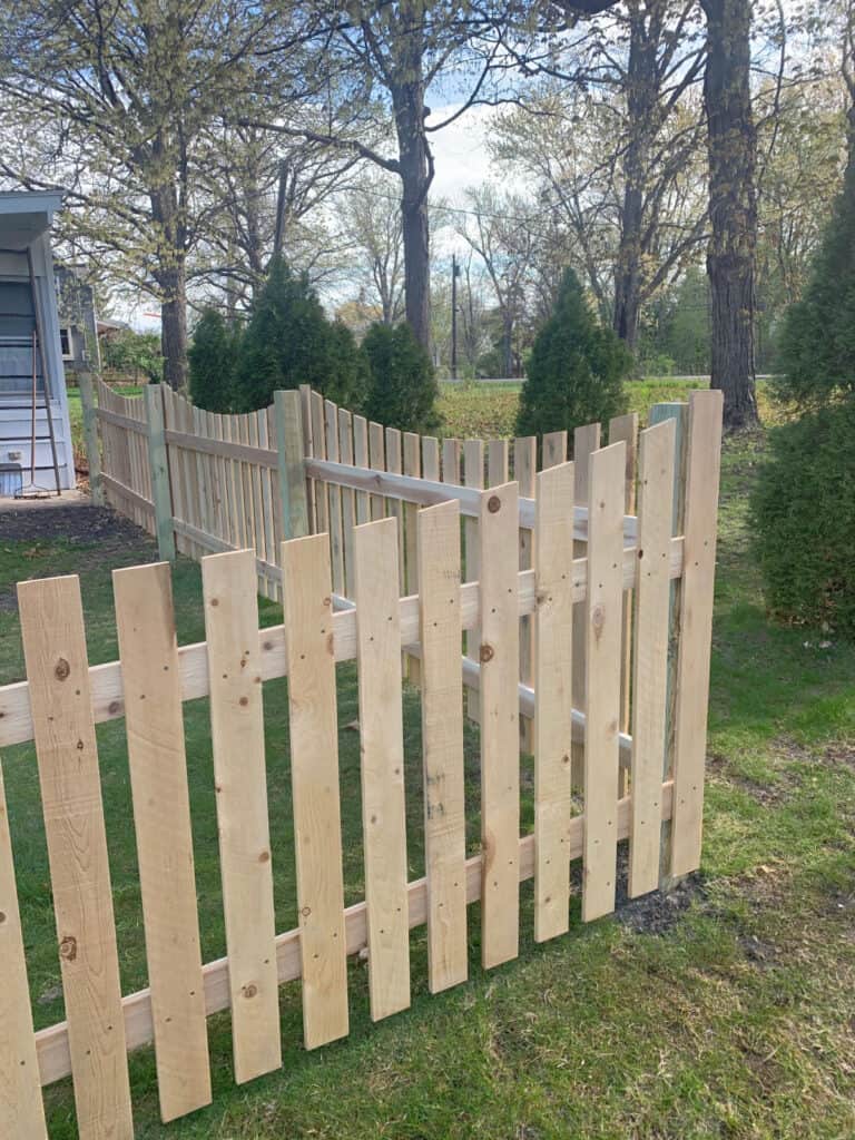 Custom wooden picket fence.