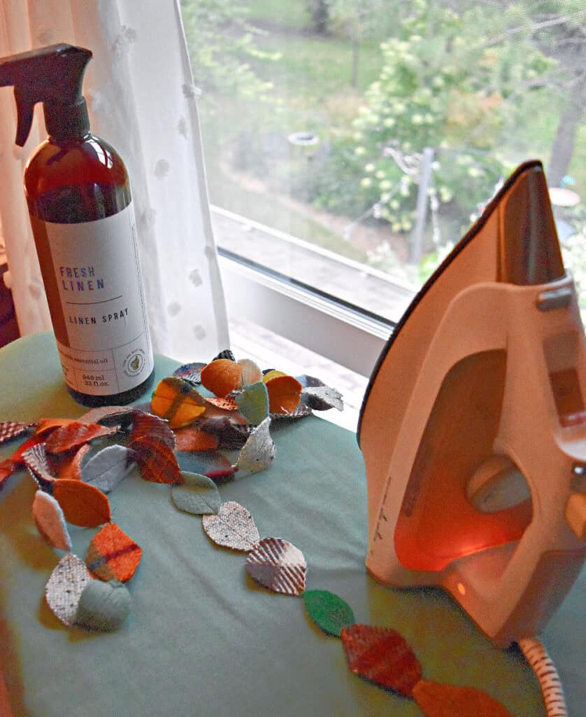 Ironing scrap fabric garland.