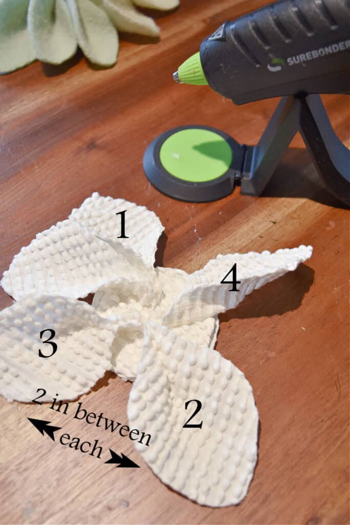 How to glue fabric petals to ornament.