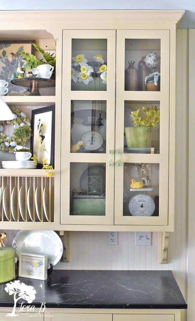 Kitchen glass cabinet display ideas featuring Spring vintage accessories.