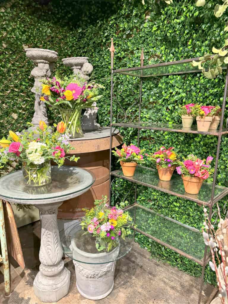 Fresh floral arrangements in display.