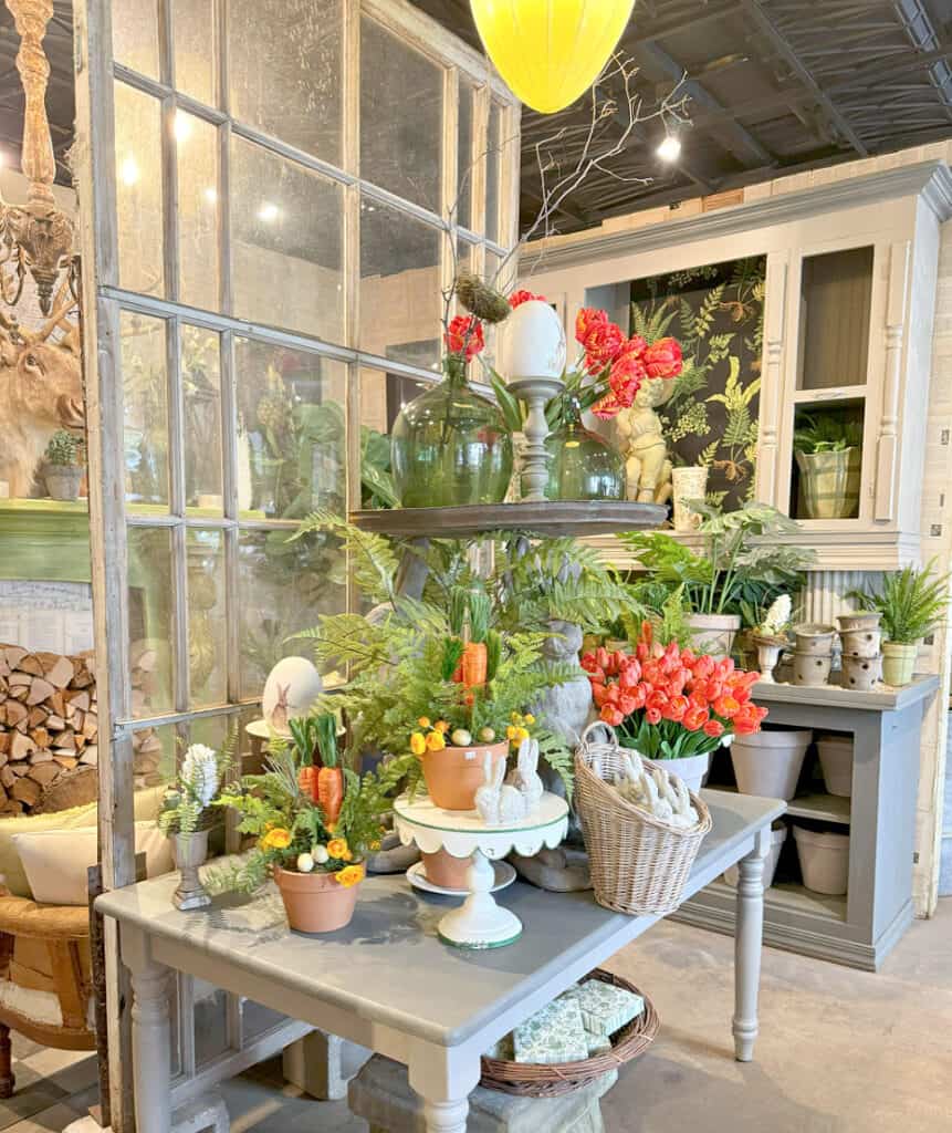 Floral shop display with red tulips.