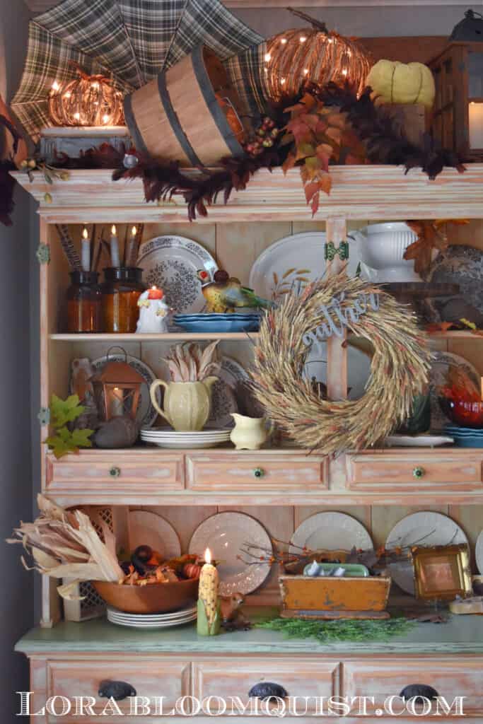Fall decorated hutch with vintage and thrifted finds.