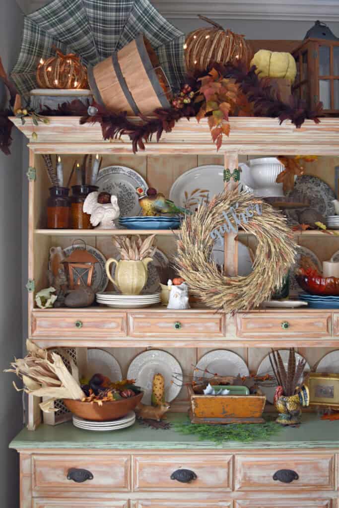 Autumn hutch display with vintage finds.