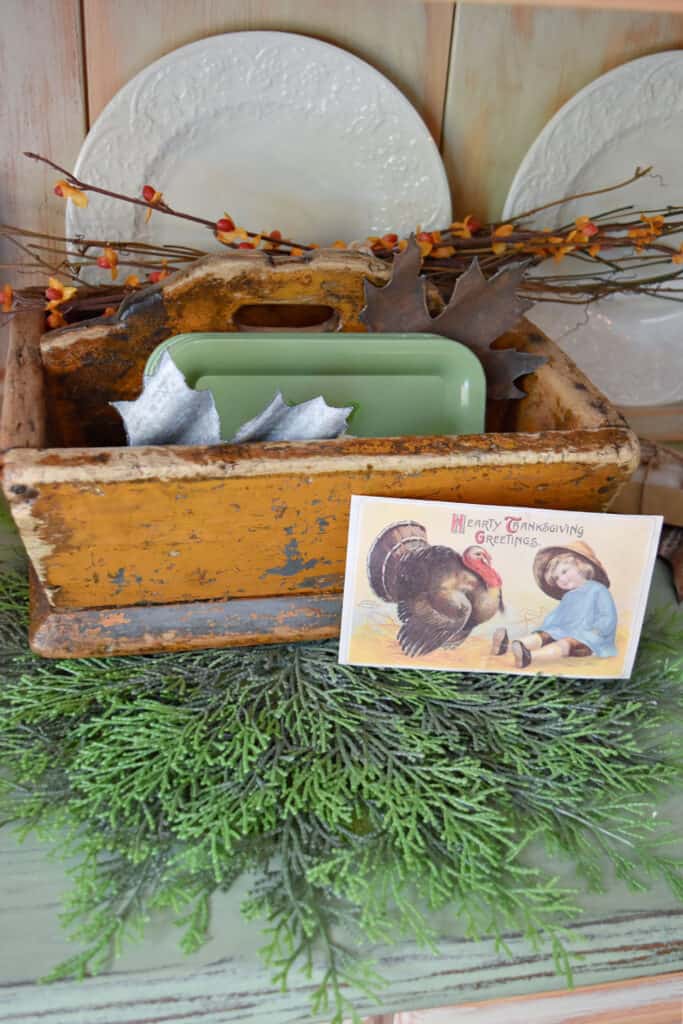 Vintage utensil tray as Fall decor.
