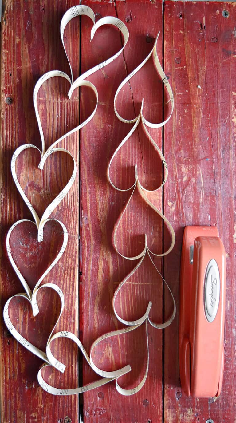 DIY paper heart garland with vintage music.