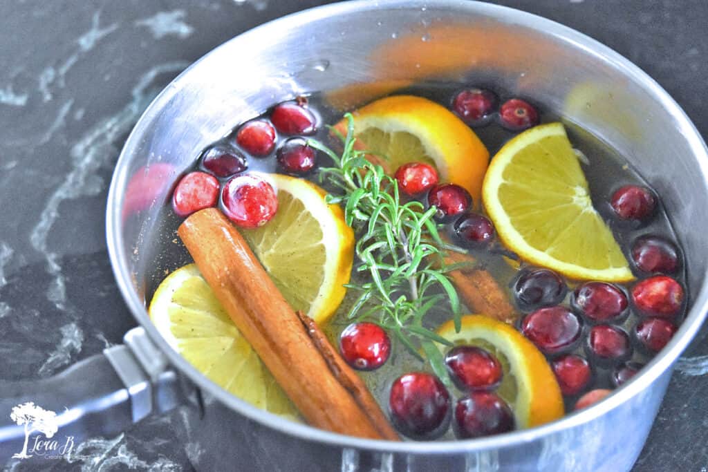 Fresh orange slices, cranberries and spices combine in a saucepan for an aromatic holiday simmer.