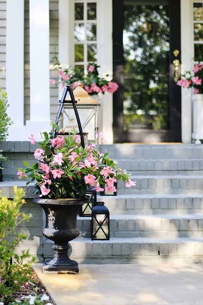 DIY obelisk with flowers in urn