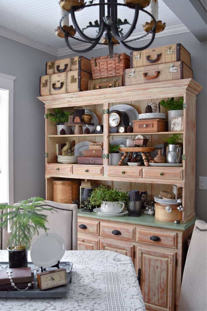 Transitional winter styled hutch decor.