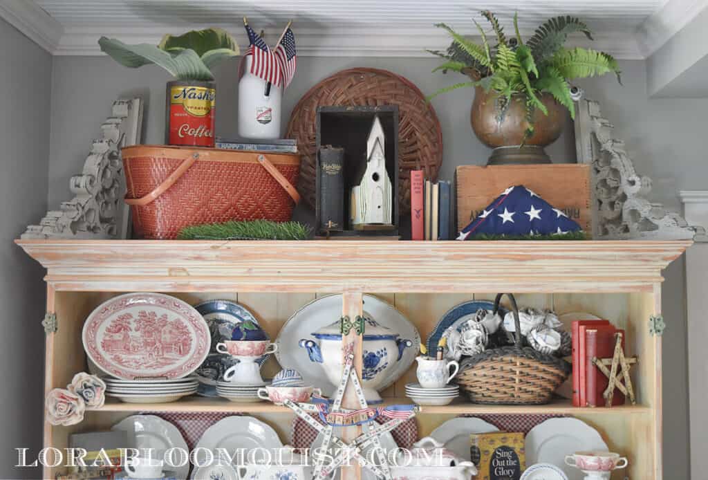 Americana Patriotic hutch display with vintage finds.