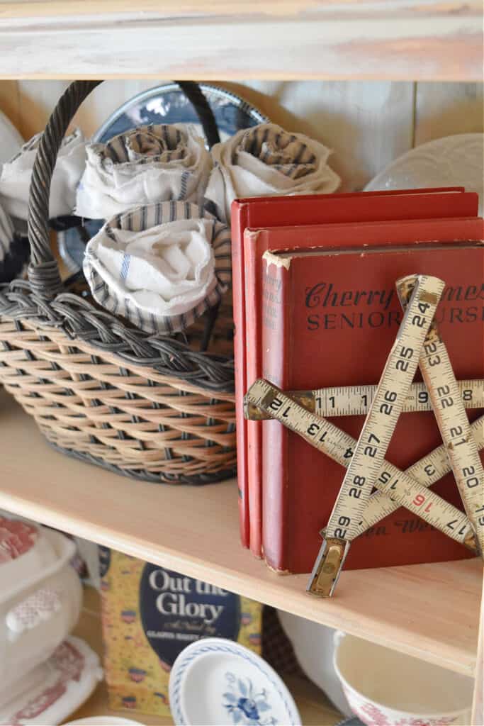 Vintage ruler folding star and DIY fabric flowers.