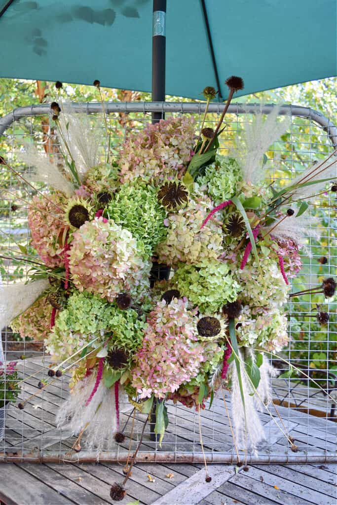 DIY fresh hydrangea wreath with spent garden flowers.