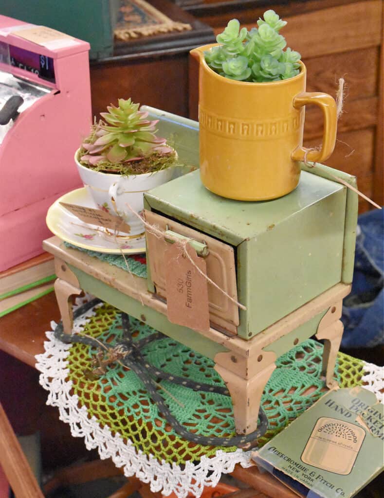 Vintage green doll stove