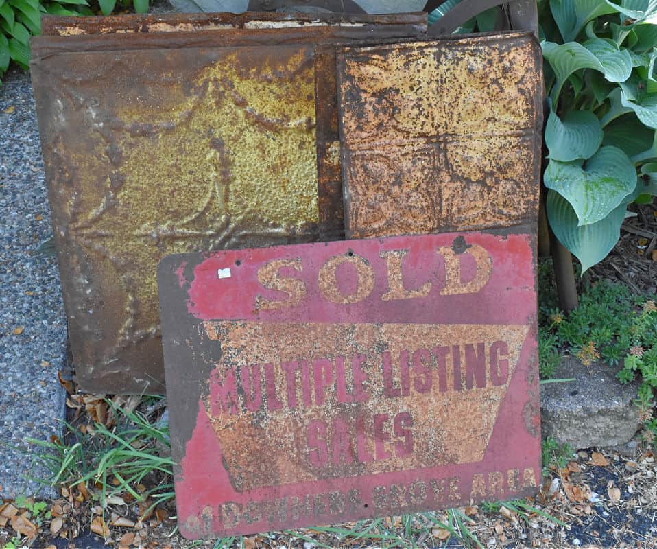 Vintage metal ceiling tin and old sign