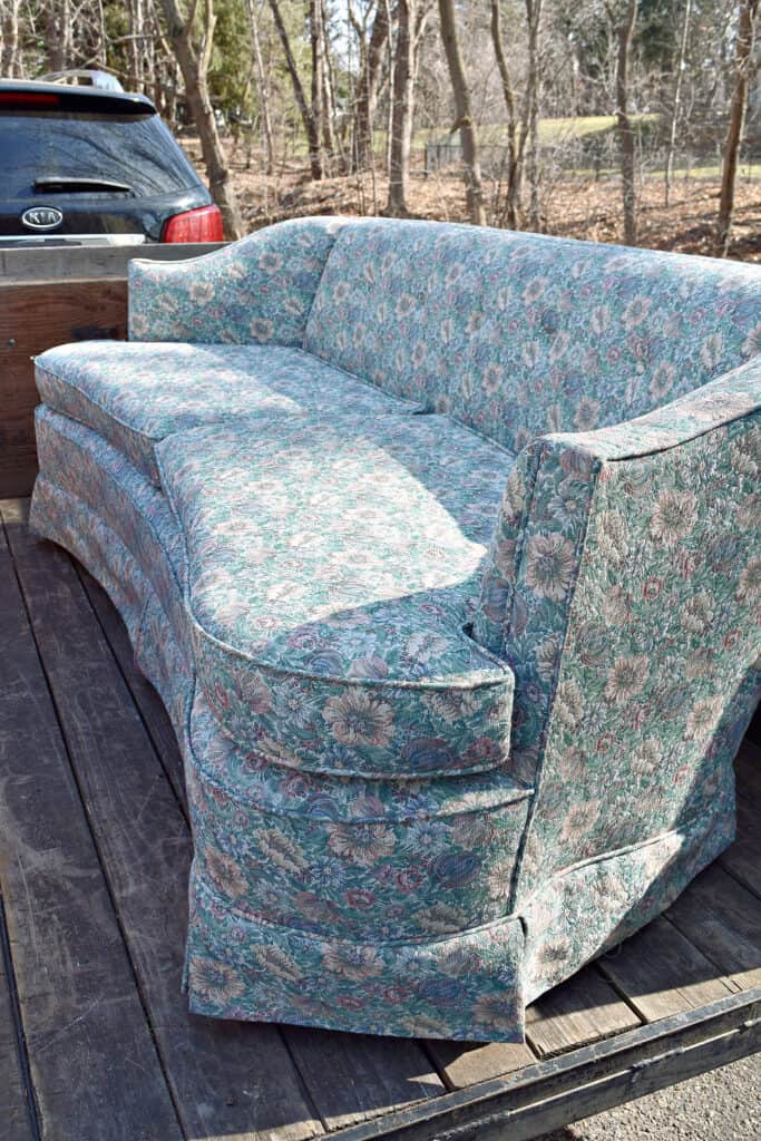 Vintage Tapestry floral couch on trailer.
