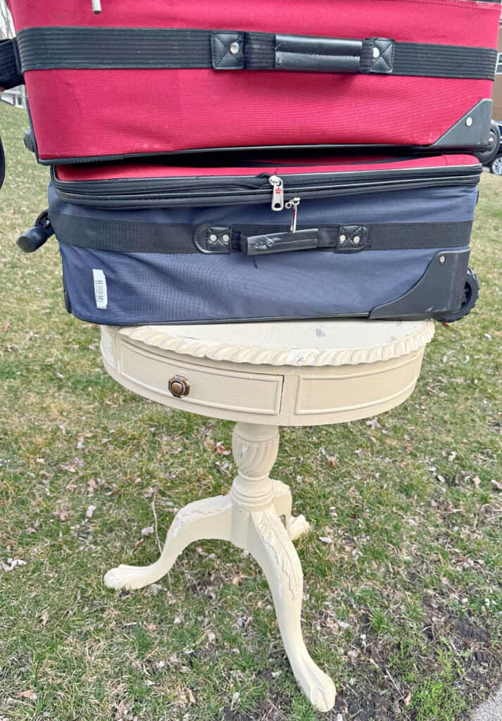 Vintage accent table in curbside pile.