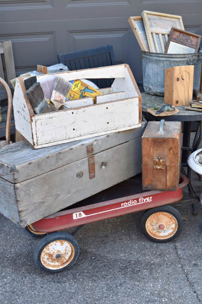 Vintage curbside finds: tool boxes and old wagon.