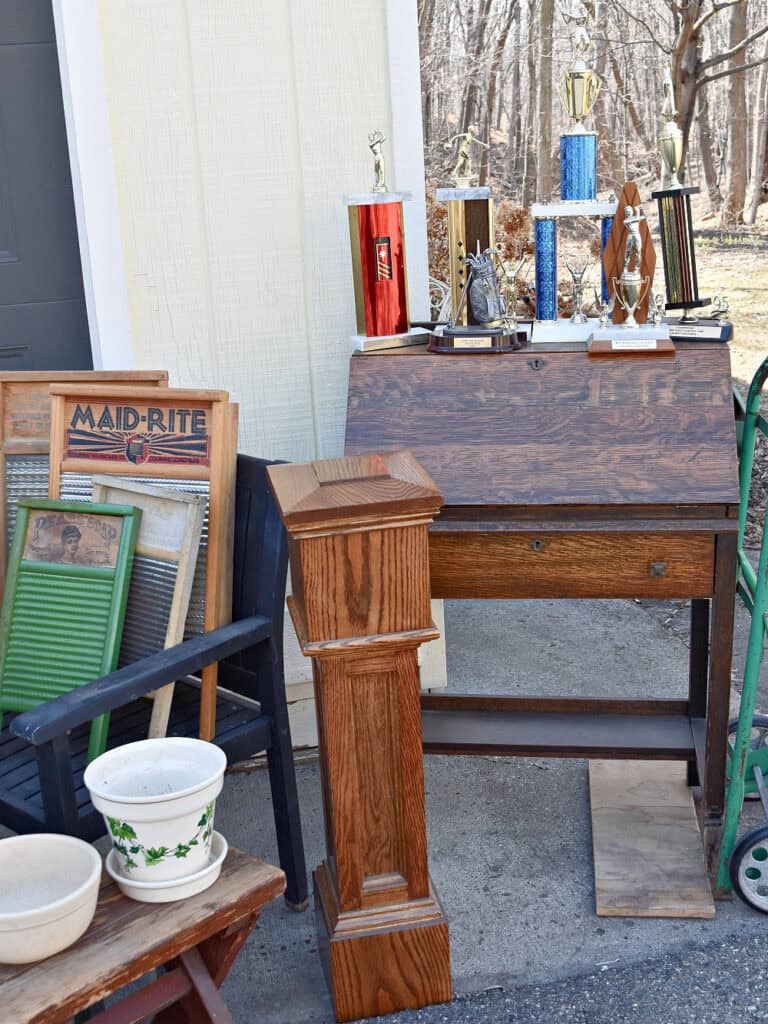 Curbside junk finds: trophies and vintage oak desk.