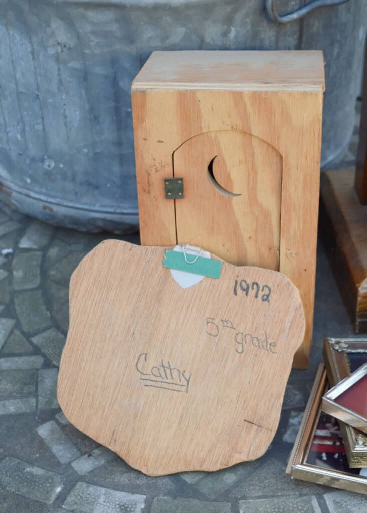 Handmade moon outhouse.