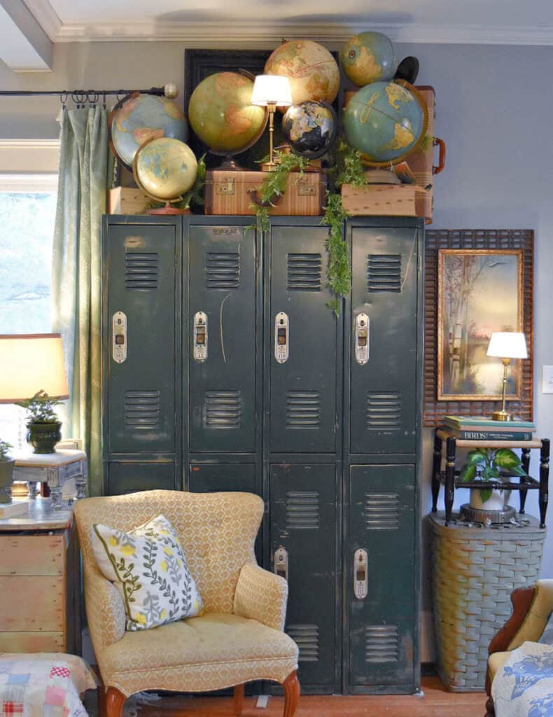 Vintage green lockers with globe collection.