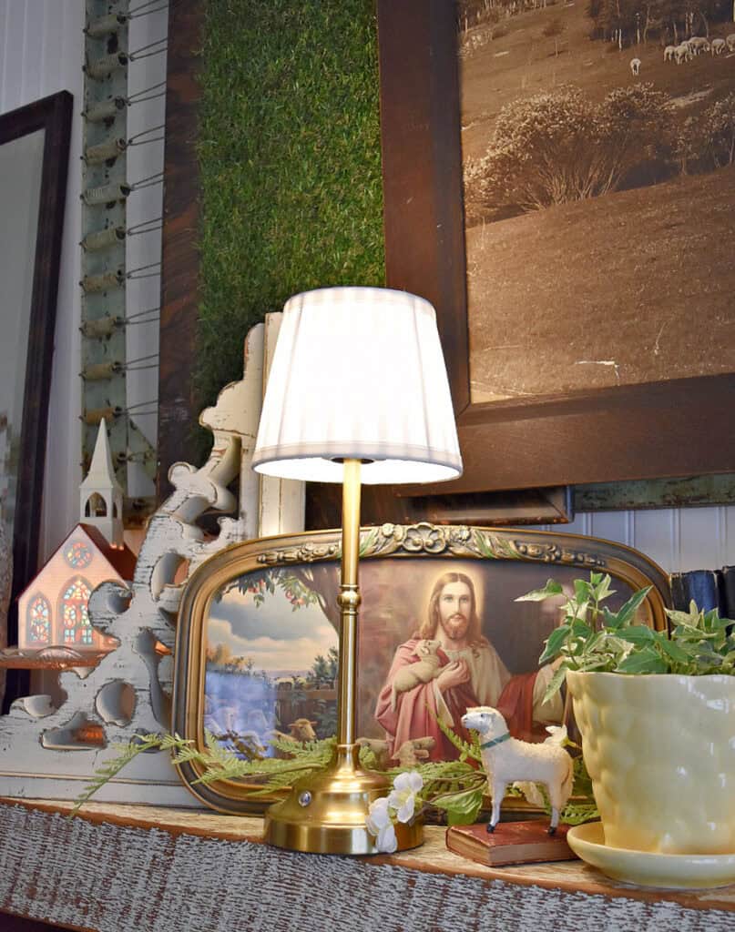 Antique Jesus as Shepherd framed pic on mantel.