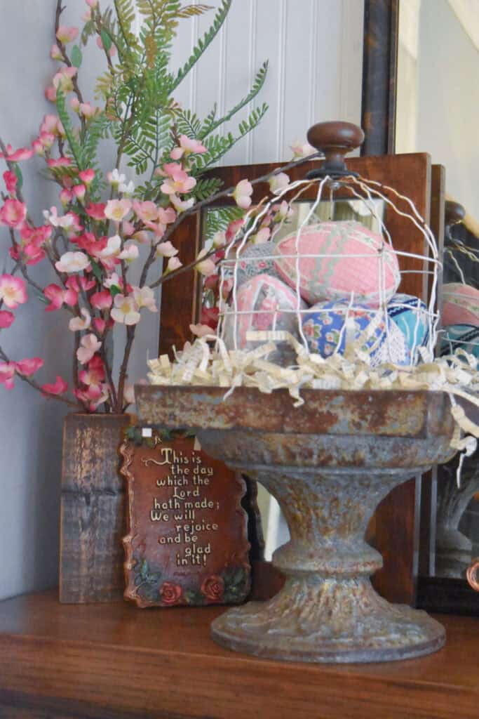 Vintage finds as Easter decor on mantel.