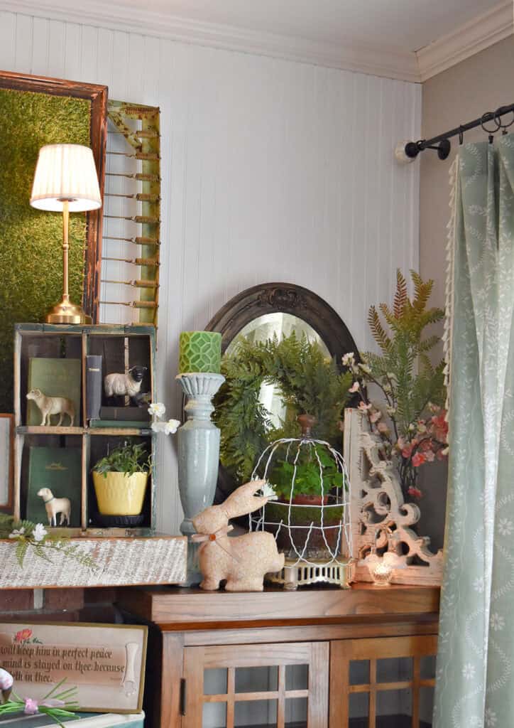 Spring decorated mantel with vintage finds.
