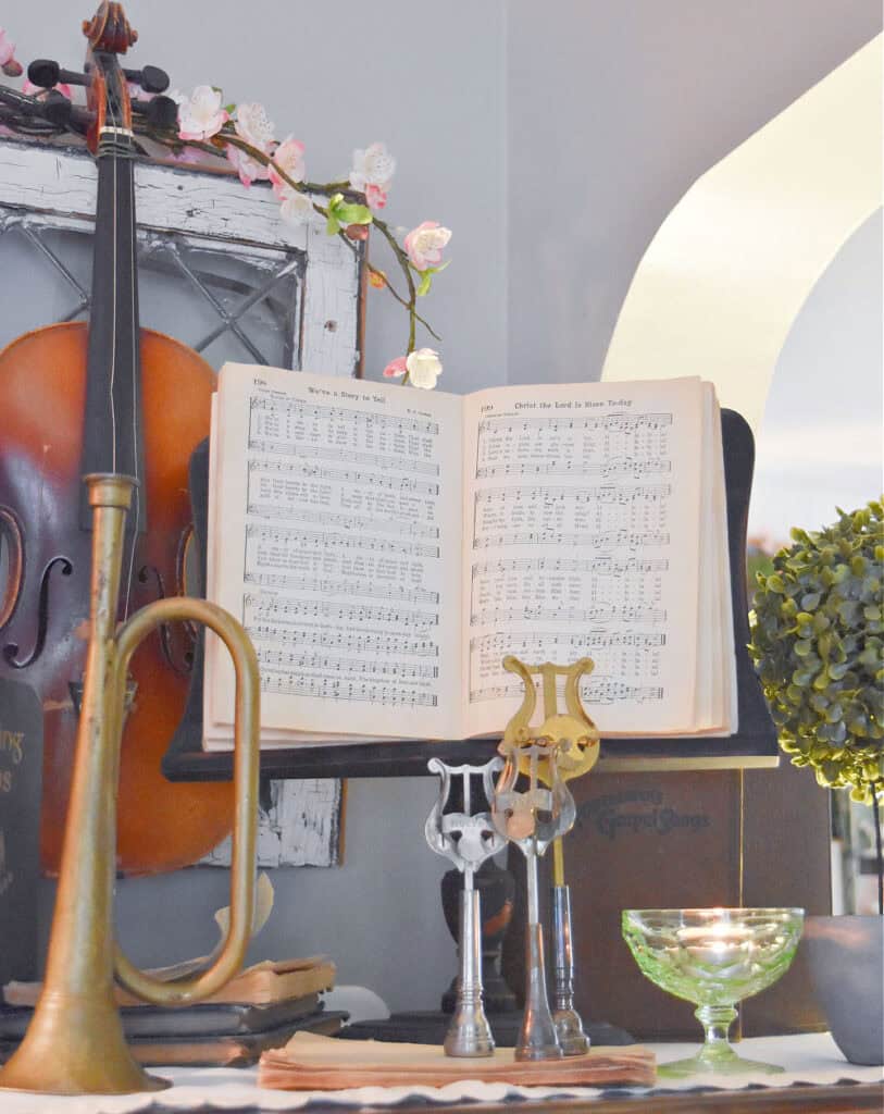 Upright antique piano with Spring decor.