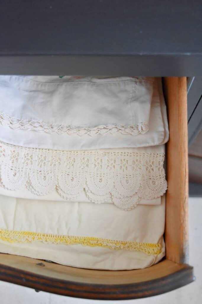 Vintage pillowcases with lace edging.