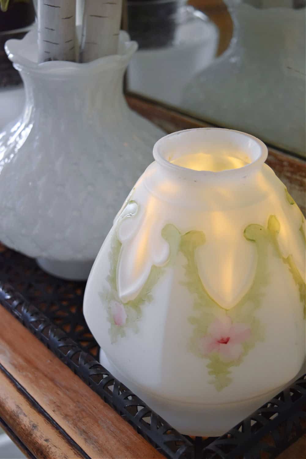 Antique handpainted light globe with candle.