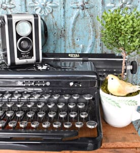 Vintage typewriter and camera.