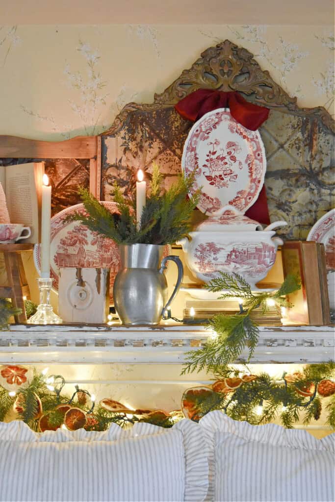Red and white transferware decorating a Christmas bedroom.