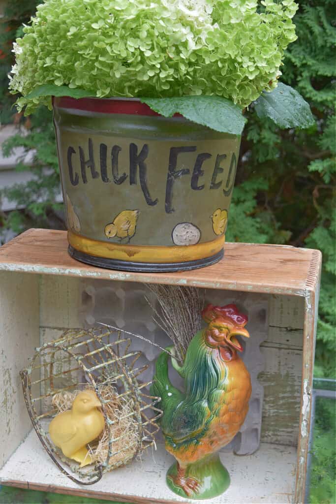 Rooster pitcher in crate.