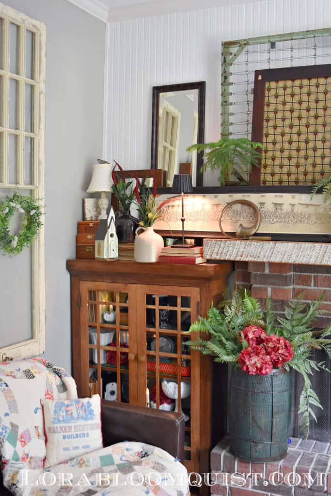 Patriotic mantel and cupboard decor with vintage style.
