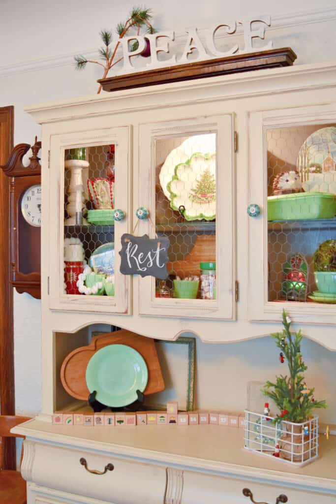 Christmas decorated painted hutch.