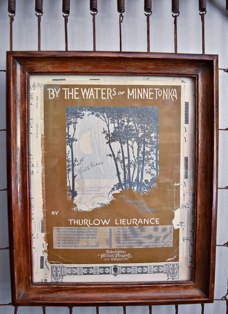 Framed vintage sheet music art.