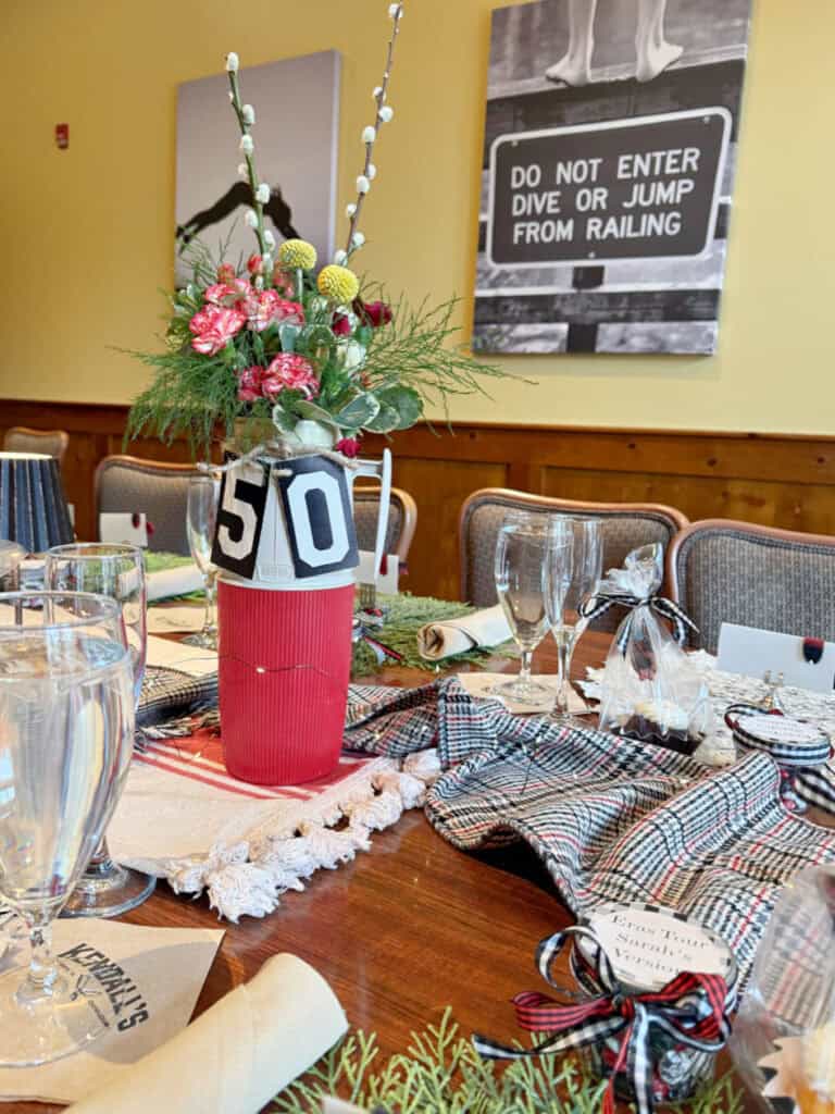 Vintage thermos flower arrangement as centerpiece