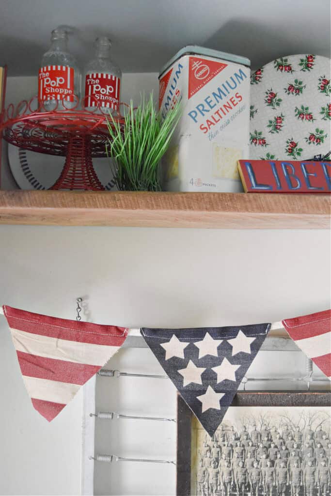 Vintage americana finds in patriotic decor display.