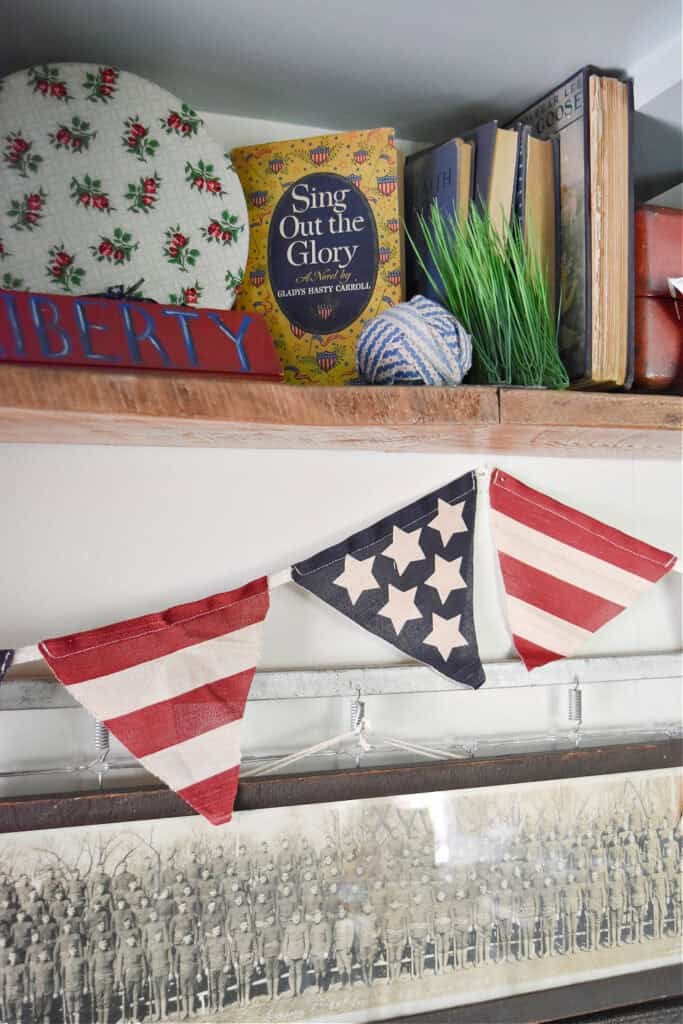 Red, white and blue americana vintage finds as patriotic decor display.