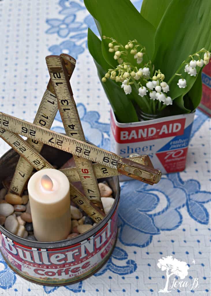 Vintage ruler star and old tins